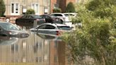 20 cars caught in flood outside East Lansing apartments