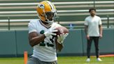 Packers return WR Dontayvion Wicks, lose TE Josiah Deguara to open Thursday’s practice