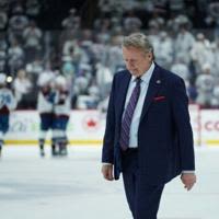 Winnipeg Jets head coach Rick Bowness, walking off the ice after his club was ousted from the NHL playoffs by Colorado, announced his retirement