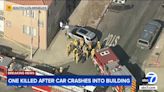 Person dies after being pinned between SUV and building in South LA