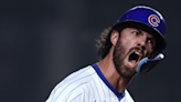 Dansby Swanson hits a tiebreaking 2-run home run as the Chicago Cubs top the Cincinnati Reds 7-5 at a wet Wrigley Field