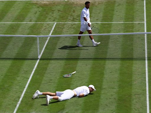 Horror moment Wimbledon star collapses to ground in agony and RETIRES