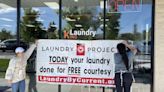 Nonprofit sponsors free service at laundromat to lighten the load for a day