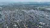 Ukraine-Russia news – live: One dead as Putin’s troops ‘fire at rescue workers in flood-hit Kherson’