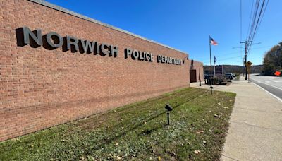 Norwich bank employee robbed at gunpoint