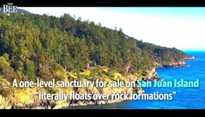 See San Juan Island home for sale in Washington— sanctuary floating over rocks, water