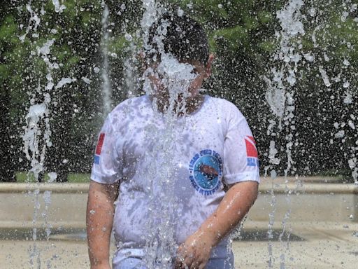 Americans coast-to-coast sweat out historic heat wave