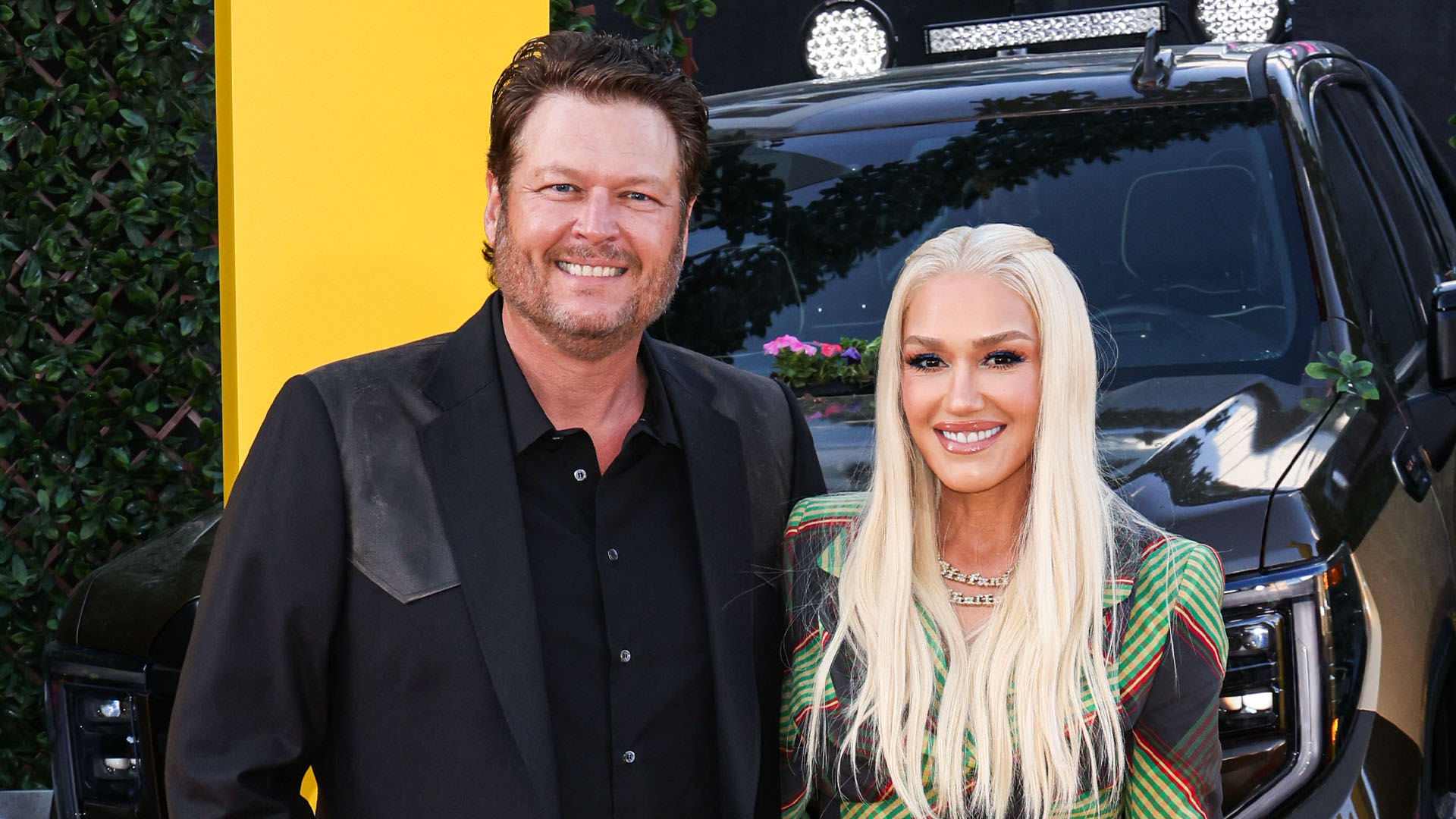 Gwen Stefani rocks mini plaid dress at Fall Guy premiere with Blake Shelton