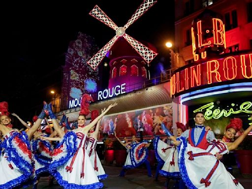 The Moulin Rouge cabaret in Paris has its windmill back, after a stunning collapse