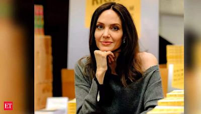 Did Angelina Jolie once plan to hire a Hitman? What unexpected twist saved her life?