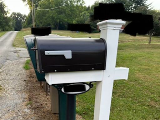 My nasty neighbor left a rude note about my mailbox - he picked the wrong girl