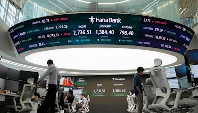Stock market today: Asian stocks are mostly higher as Bank of Japan raises benchmark rate