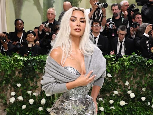 Kim Kardashian doesn't care what you think. She'll keep wearing extreme corsets to the Met Gala.