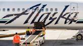 Alaska Airlines' new electronic bag tag will let you speed through the airport lobby