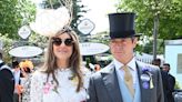 Elizabeth Hurley steps out on the arm of her poet pal at Ascot