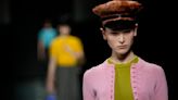 Prada gives new meaning to bows and aprons, historic elements of women's wardrobe, for next season