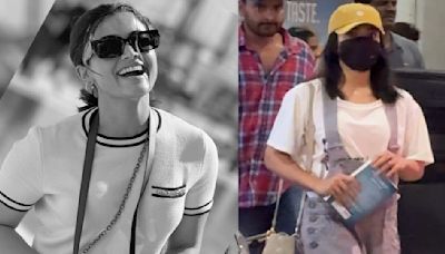 WATCH: Rashmika Mandanna sports ripped denim dungaree at airport; flaunts her obsession with Korean fashion trend