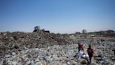 In the searing heat of the Gaza summer, Palestinians are surrounded by sewage and garbage