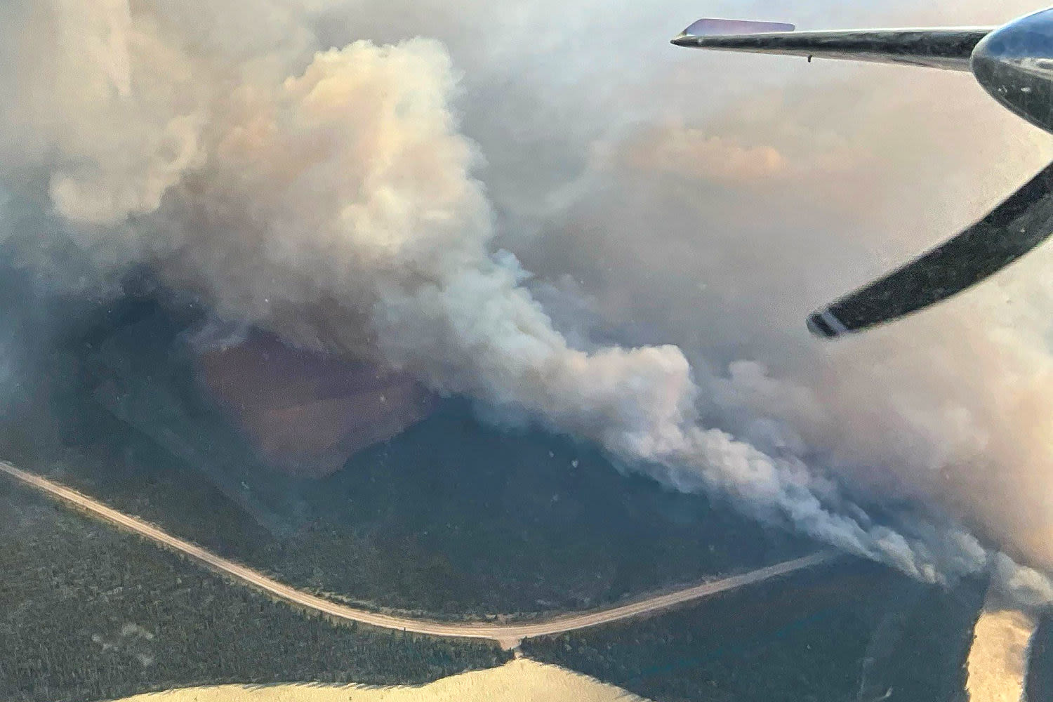 Wildfires across western U.S. and Canada force thousands to evacuate