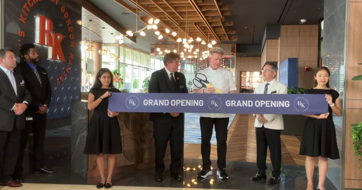 Gordon Ramsay cuts the ribbon at his new restaurant at the Four Seasons Hotel in St. Louis