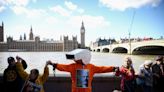 Assange supporters form human chain at UK parliament