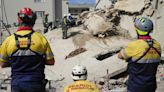 Rescue efforts for dozens missing in South Africa building collapse are boosted by 1 more survivor