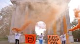 Just Stop Oil spray orange paint over London's Wellington Arch