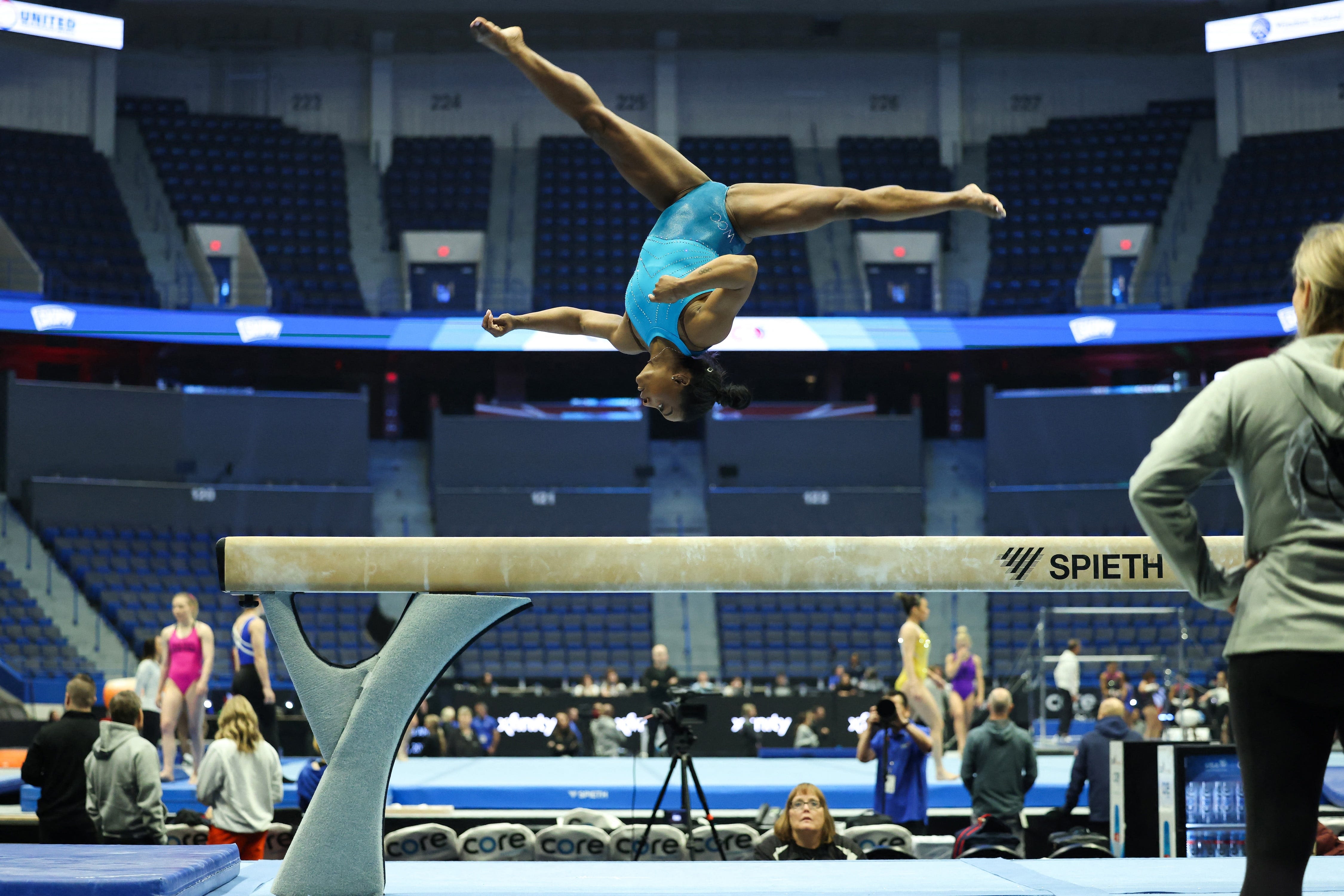 What's it like to train with Simone Biles every day? We asked her teammates.
