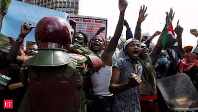 After passage of controversial finance bill in Kenya, demonstrators set Parliament building on fire; nearly 10 protesters dead