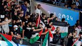 ‘This is sport’: Israel fans try to put politics behind them at Olympics
