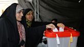 Iranians vote in run-off presidential race amid widespread apathy