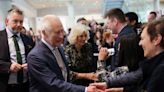 Smiling King Charles visits cancer centre on his return to public duties