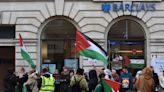 Cambridge students stage ‘die-in’ at Barclays bank to protest against Israel and fossil fuels