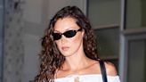 Bella Hadid shows off toned stomach in crop top in NYC