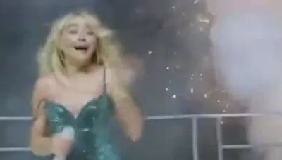 Sabrina Carpenter is hit by a firework during San Francisco show