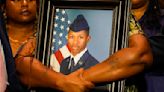 Airman’s death sparks debate over race, gun rights and self-defense