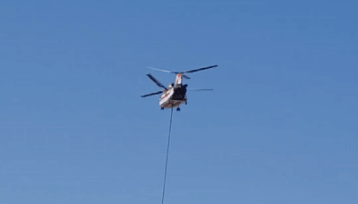 Firefighting Helicopter Gathers Water in New Mexico