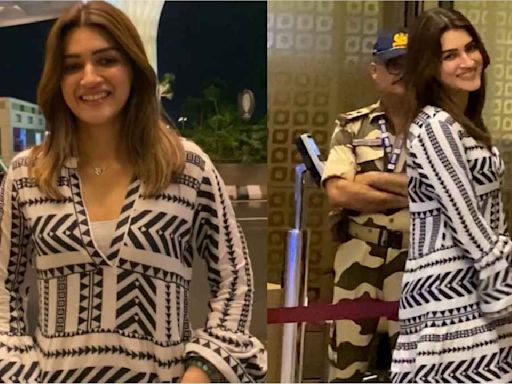 Kriti Sanon keeps it comfy & casual for the airport in printed mini-dress with black boots