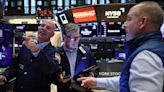 Stocks slip as US consumer confidence slumps, dollar gains