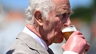 King Charles jokes 'I'd better not have too much' as he samples beer