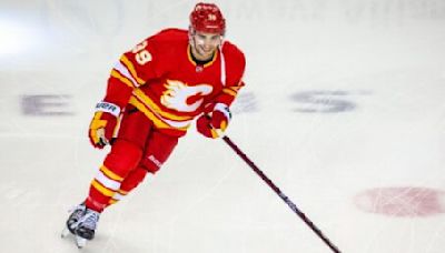 Flames lose two players to injury in loss to Canucks | Offside