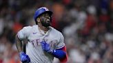 García's grand slam highlights 4-homer game as AL West-leading Rangers beat Astros 13-5