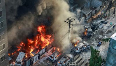 Bangladesh wakes to torched government buildings, internet blackout