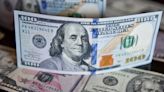 Dollar hovers near 8-week low as payrolls test looms