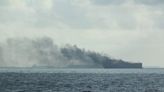 Oil tankers on fire off Singapore, crew members rescued