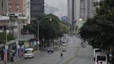 Venezuela capital eerily calm after Maduro and opposition claim election victory