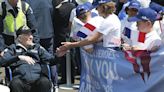 French children hail D-Day veterans as heroes as they arrive in Normandy for anniversary events | Chattanooga Times Free Press