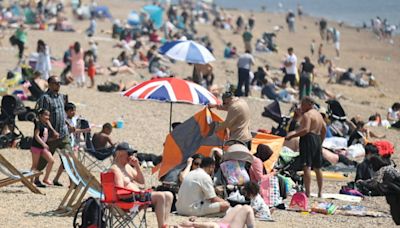 Hundreds rush to beaches and parks to soak up glorious 23C sunshine