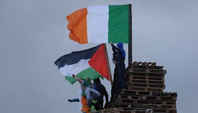 Tricolours, election posters and sectarian slogans on display as bonfires lit across the north