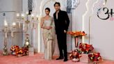 Shah Rukh Khan's children Suhana Khan in shimmer saree and Aryan Khan in black suit arrive in style at Anant Radhika wedding ceremony